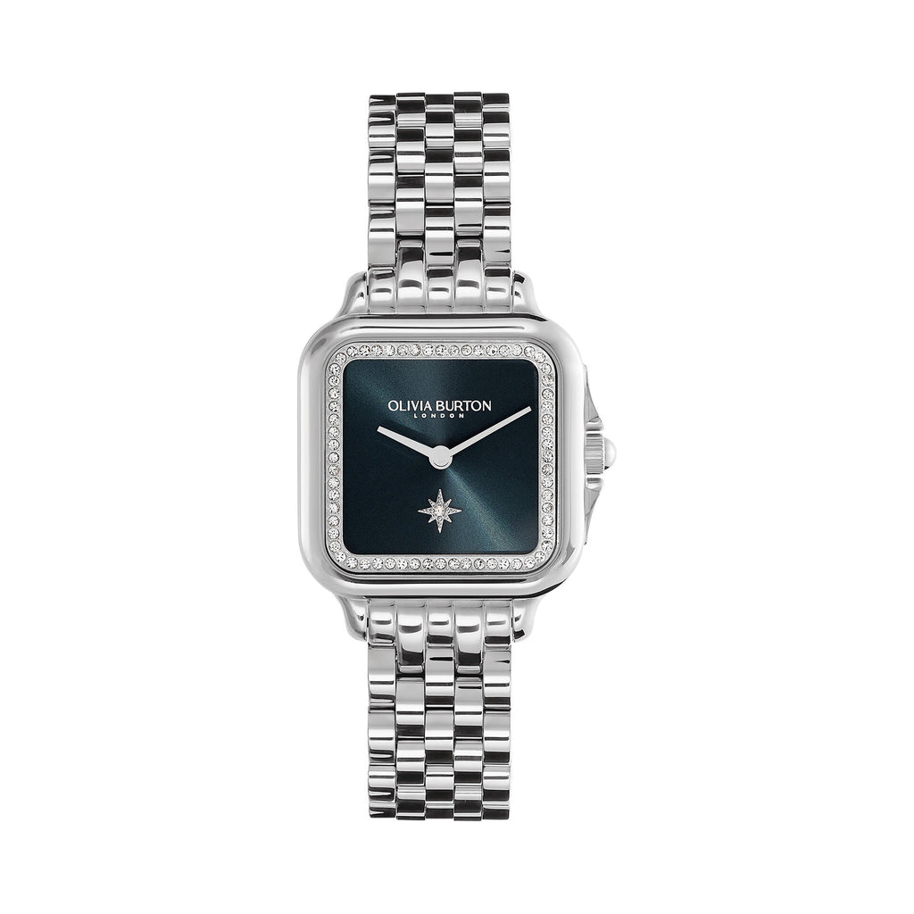 Olivia Burton Grosvenor Square watch showing the blue crystal dial & silver bracelet. Perfect wrist accessory.