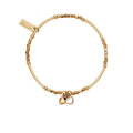 Gold bracelet with heart charms.
