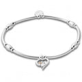Silver charm bracelet with heart-shaped pendant. 
