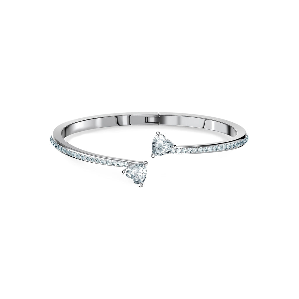 The Swarovski Attract Soul Heart Bangle, a silver metal bracelet from Swarovski, available at OD’s Jewellers in St Helens.