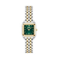 Wristwatch with green face and silver and gold linked band.
