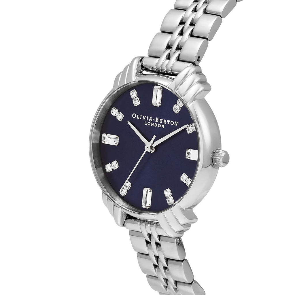 Olivia Burton stainless steel watch featuring a navy dial, art deco design and jewel hour markers.