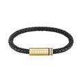 Mens BOSS Ares black braided leather bracelet with gold-plated BOSS logo detail, stylish wrist accessory.
