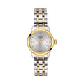 Elegant Tissot Classic Dream Lady watch displaying a stainless steel and gold-plated band with date.