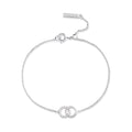 Sterling silver Olivia Burton chain bracelet featuring interlinked circles, one set with cubic zirconia stones.