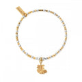 ChloBo bracelet with alternating silver & gold beads, charm with feathers. Elegant, layered wristwear.