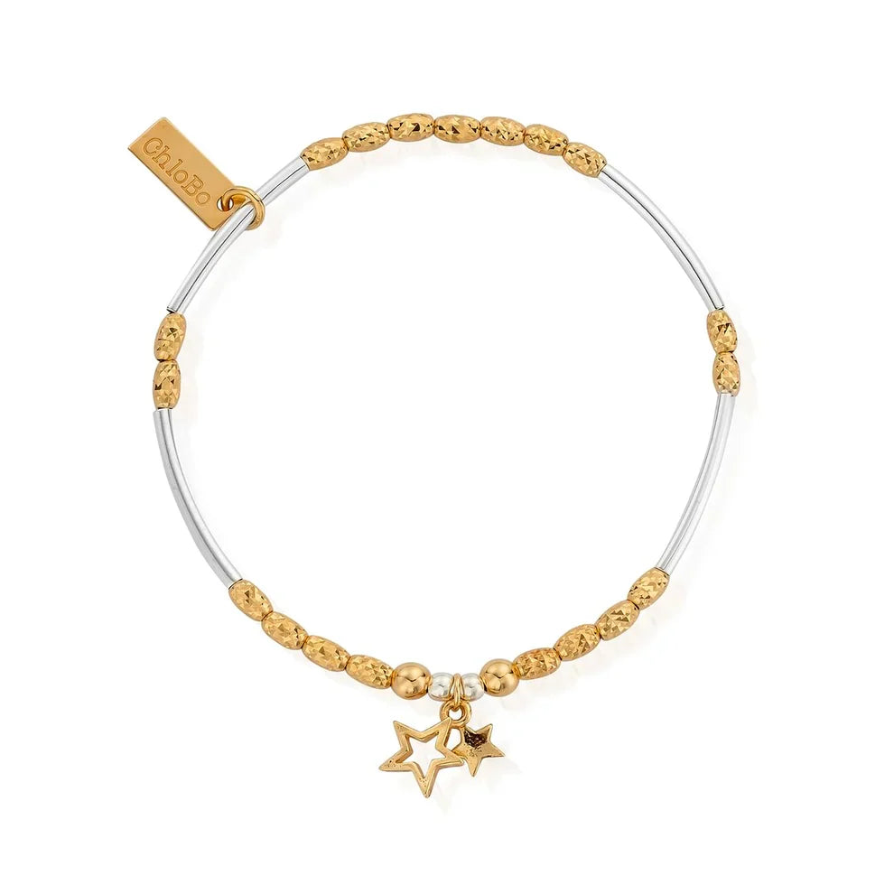 Gold and silver beaded star charm bracelet.

