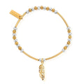 Gold and silver beaded bracelet with feather charm.
