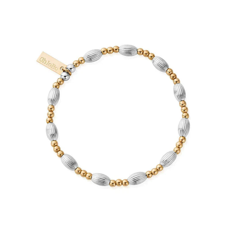A gold and silver beaded bracelet with a tag that says "ChloBo" on a white background.