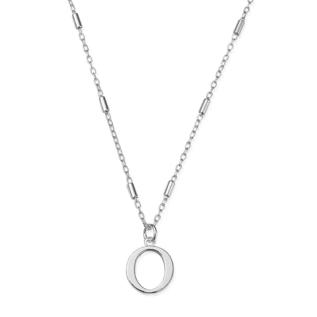 Silver necklace with a circular pendant.

