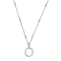 Silver necklace with a circular pendant.

