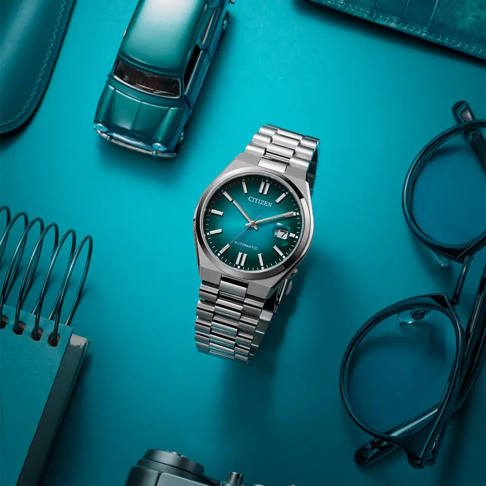Silver Citizen watch with blue face.
