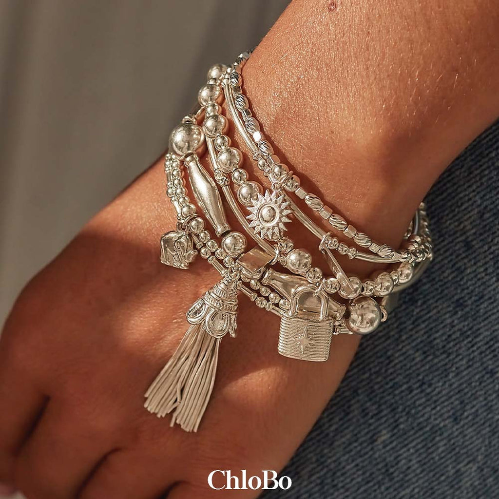 ChloBo silver bracelet stack with Didi Tassel worn on wrist