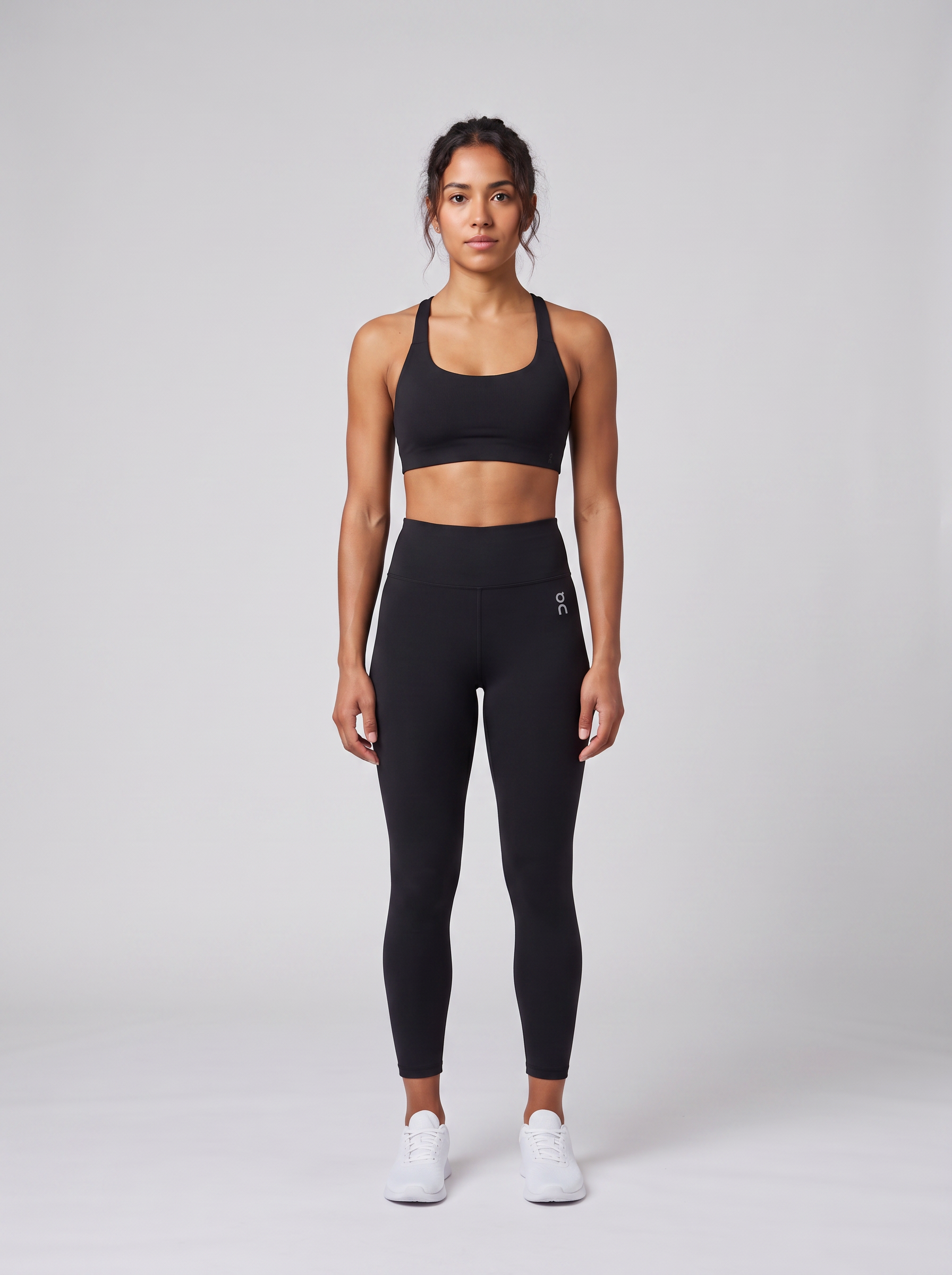Women's On Running Black Core Bra & 7/8 Studio Tights Set — on model