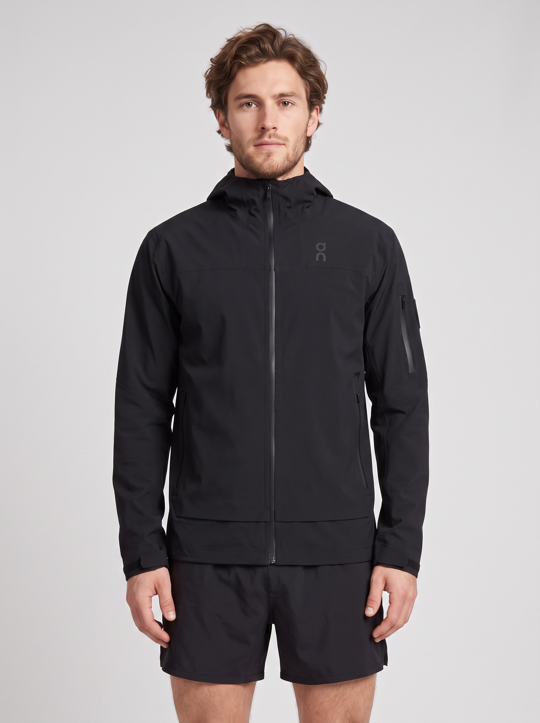 Men's On Running Black Trek Waterproof Jacket — on model