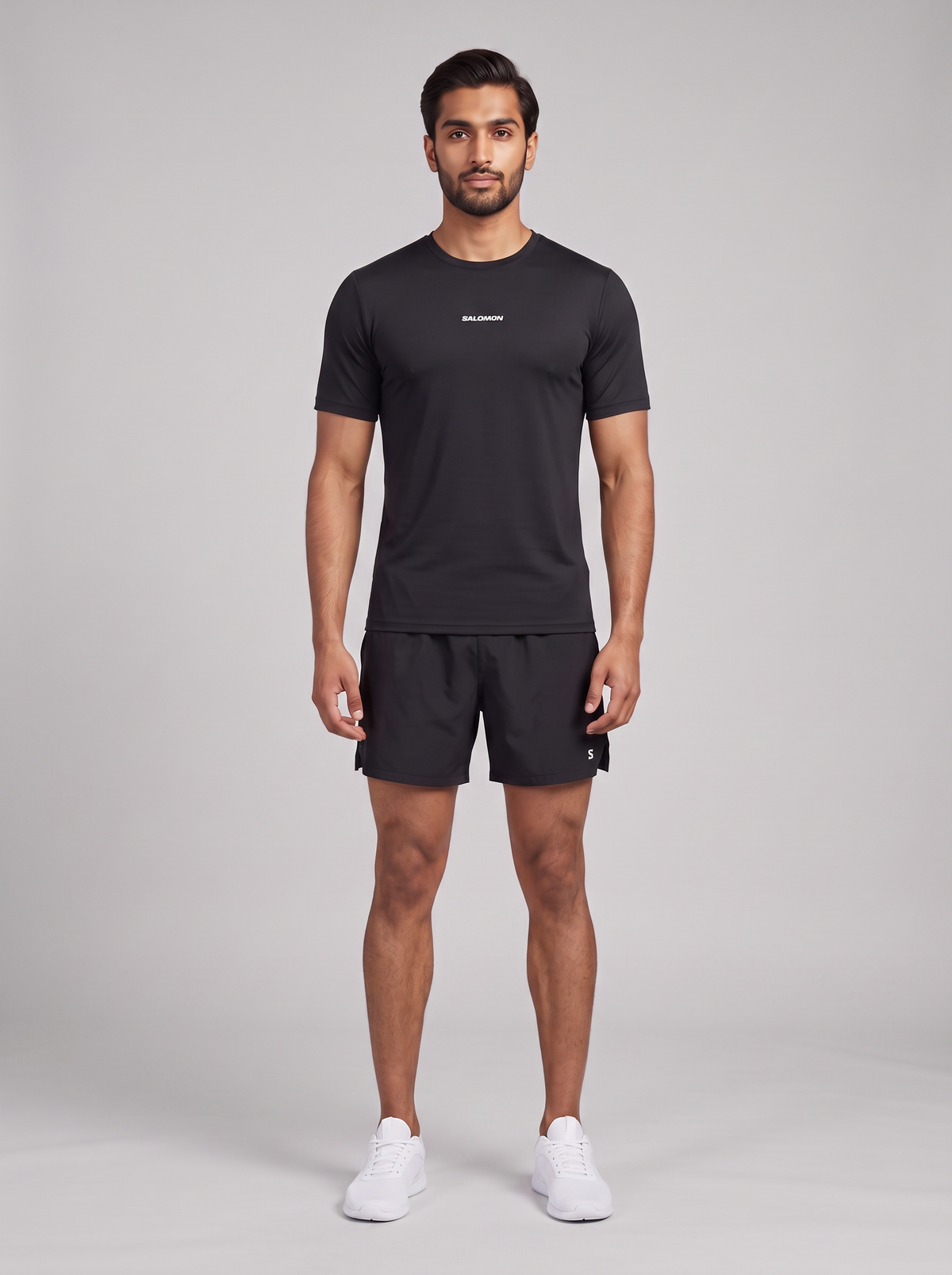 Men's Salomon Deep Black Shkout Core SS T Shirt & Salomon Deep Black SHKout Core 7" Shorts Set — on model