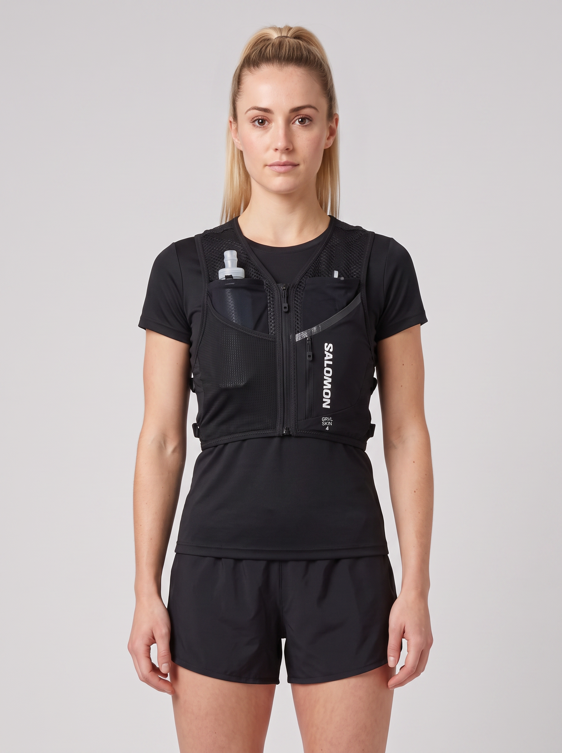 Womens Salomon Gravel Skin 4 Hydration Vest Black — on model