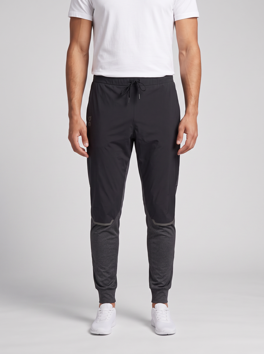 Men's On Running Black Weather Pants — on model