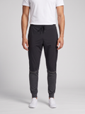 Men's On Running Black Weather Pants — on model