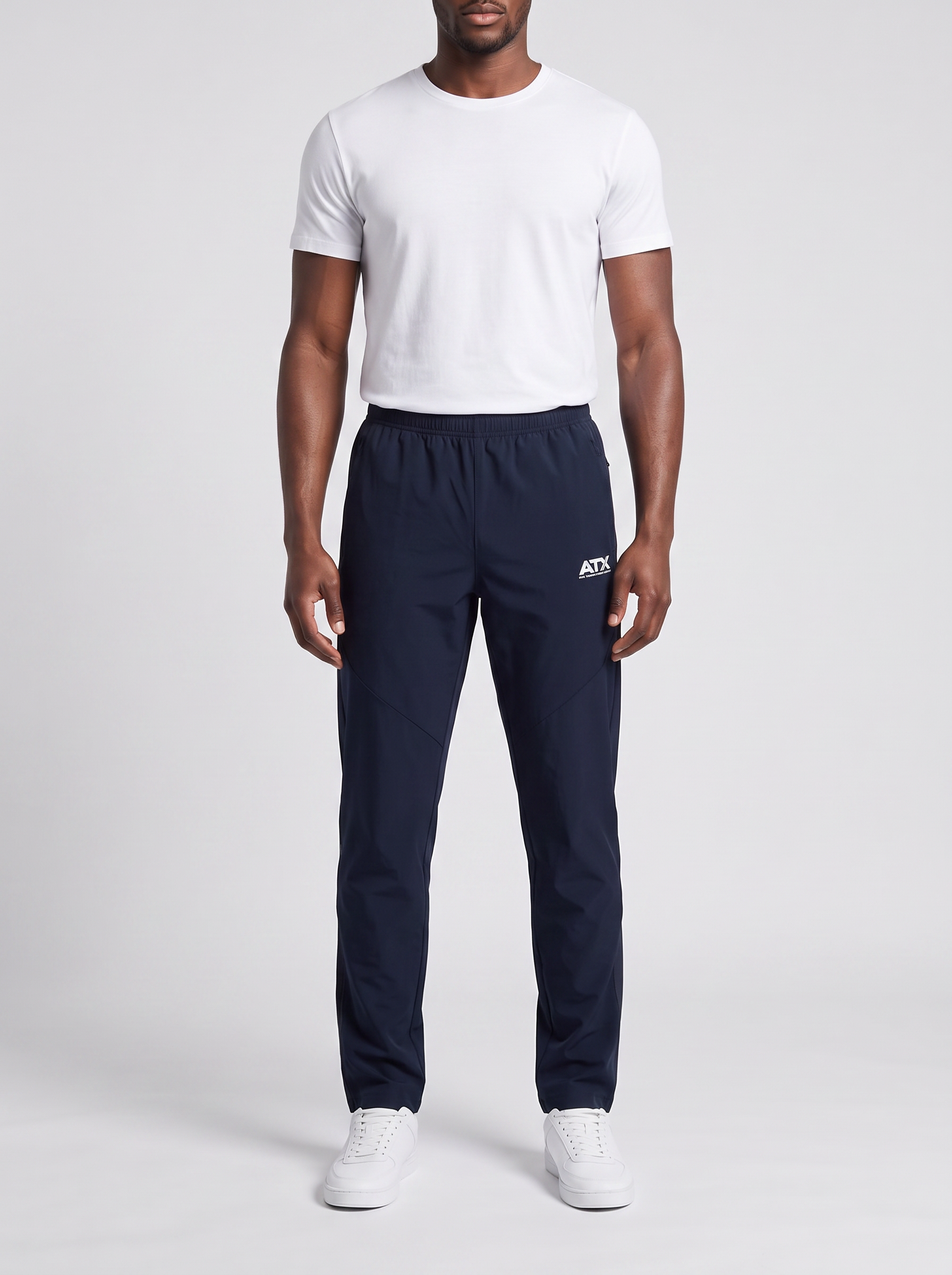 Men's ATX Traverse Track Pant in Black — on model