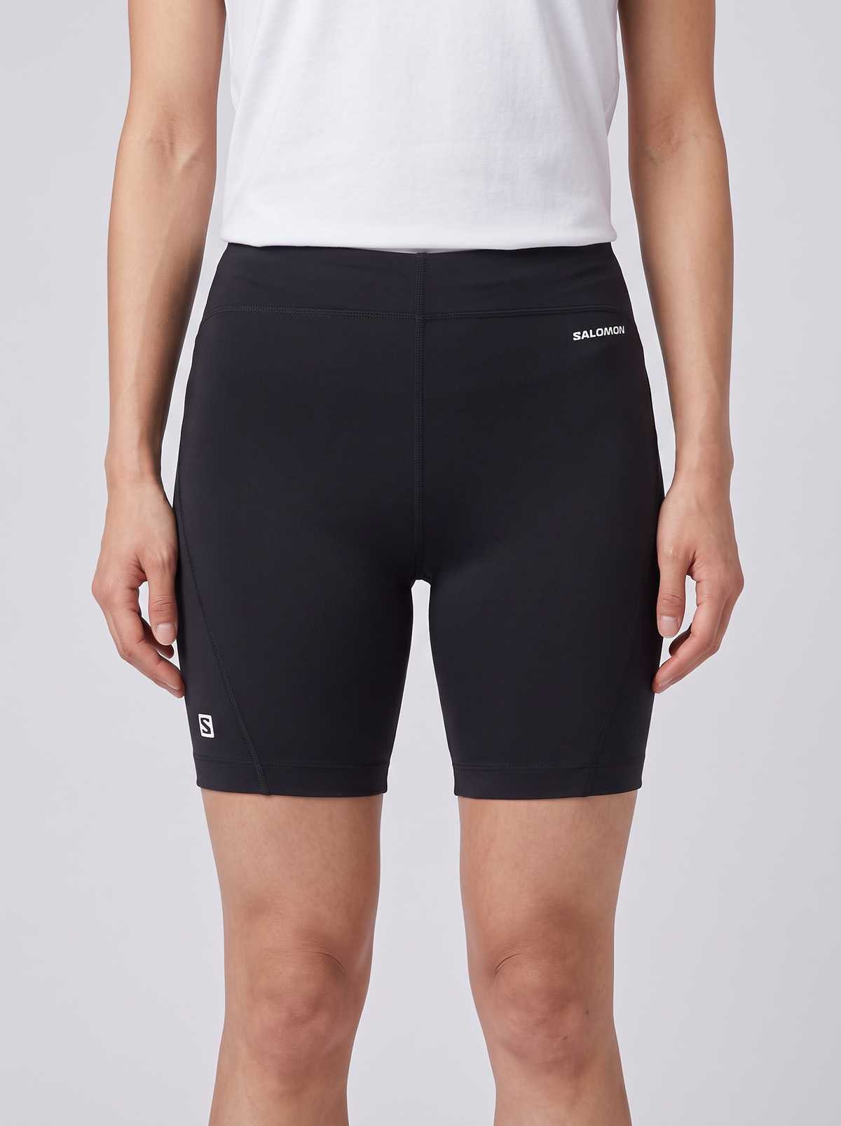 Womens Salomon Shakeout Core Shorts 6" in Black — on model