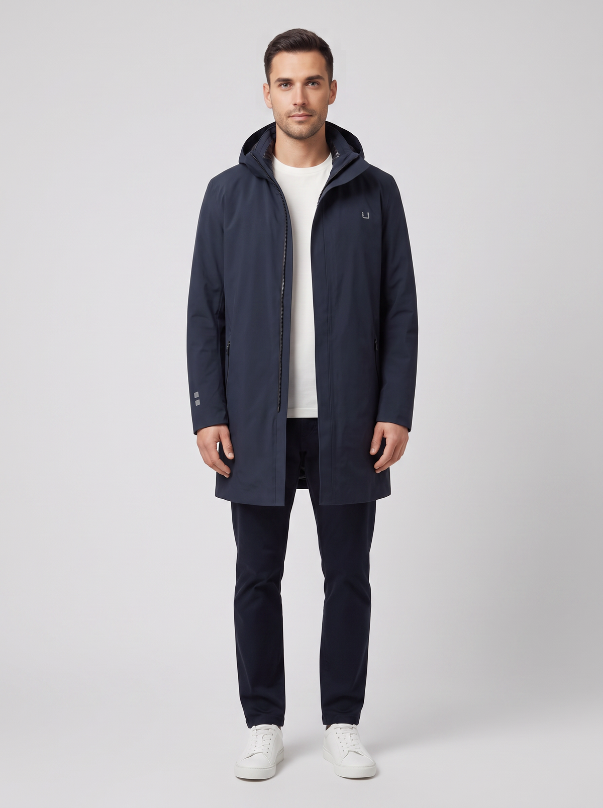 Men's UBR Black Storm Coat in Navy — on model