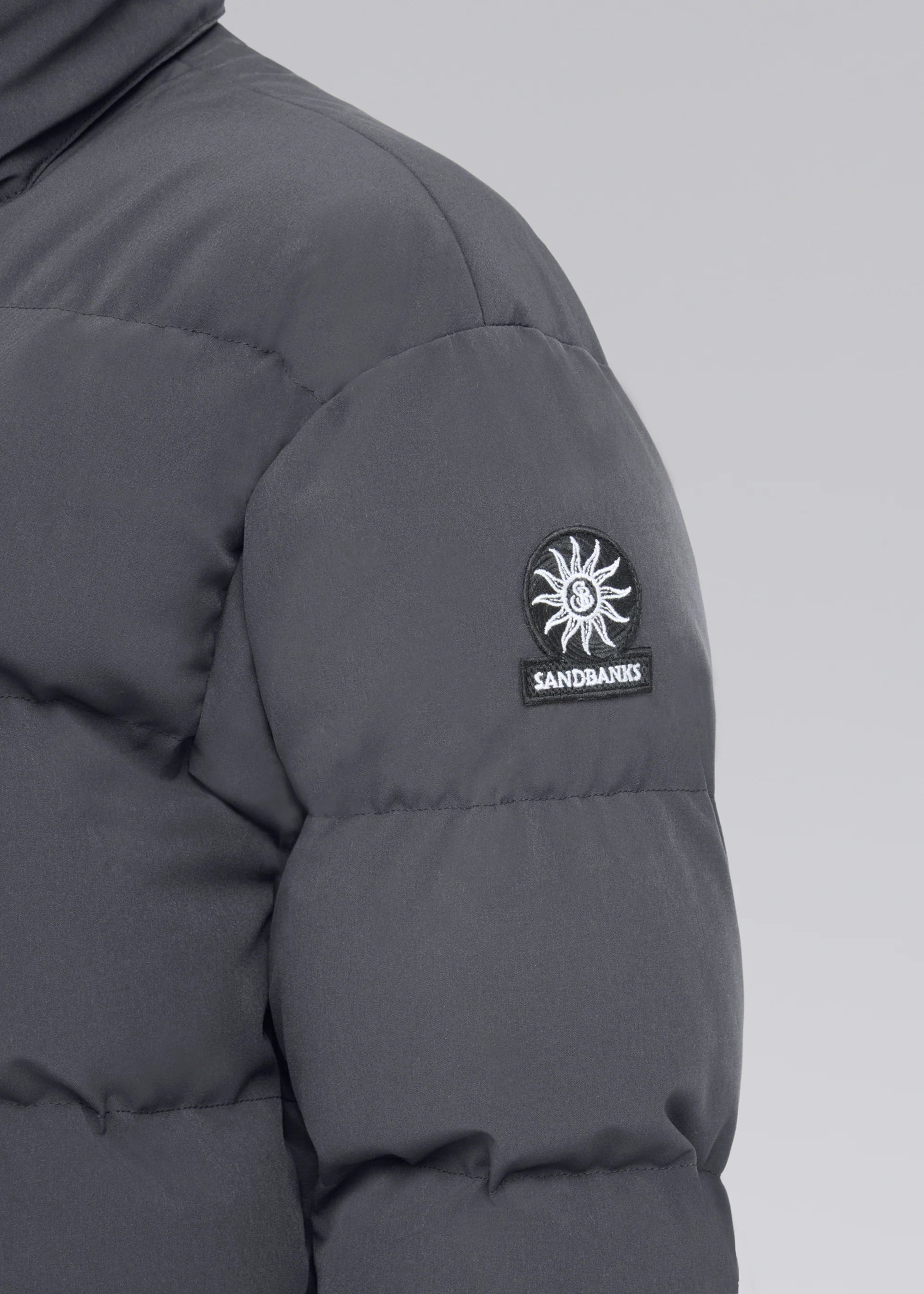 close up of Sandbanks logo on grey Haven jacket