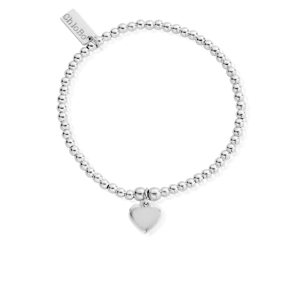 ChloBo heart bracelet, a delicate silver charm jewelry piece made of beaded strands and a heart pendant.