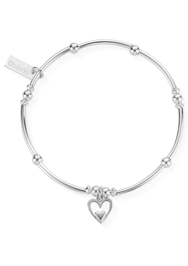 Close-up of the ChloBo Mini Noodle Ball Heart In Heart Bracelet, showcasing the sterling silver design and heart charm