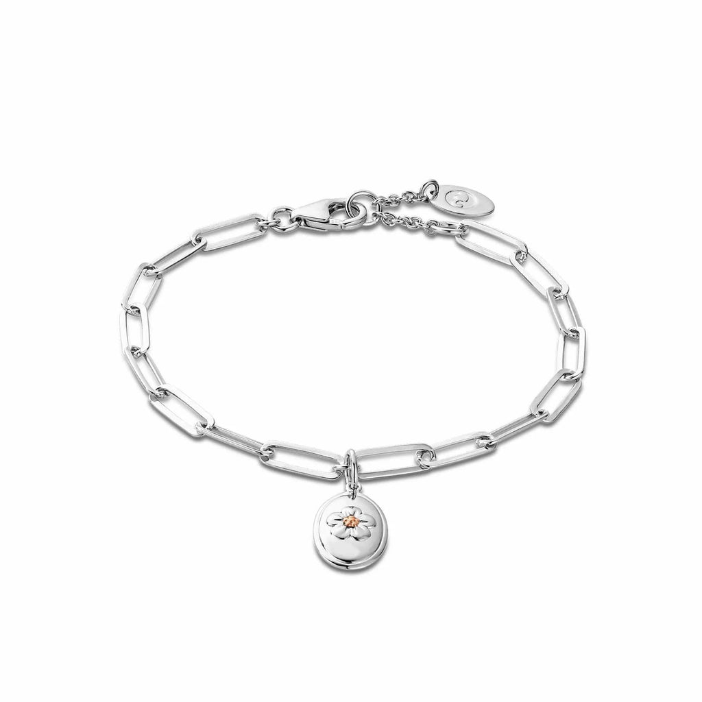 Silver chain bracelet with a flower charm.