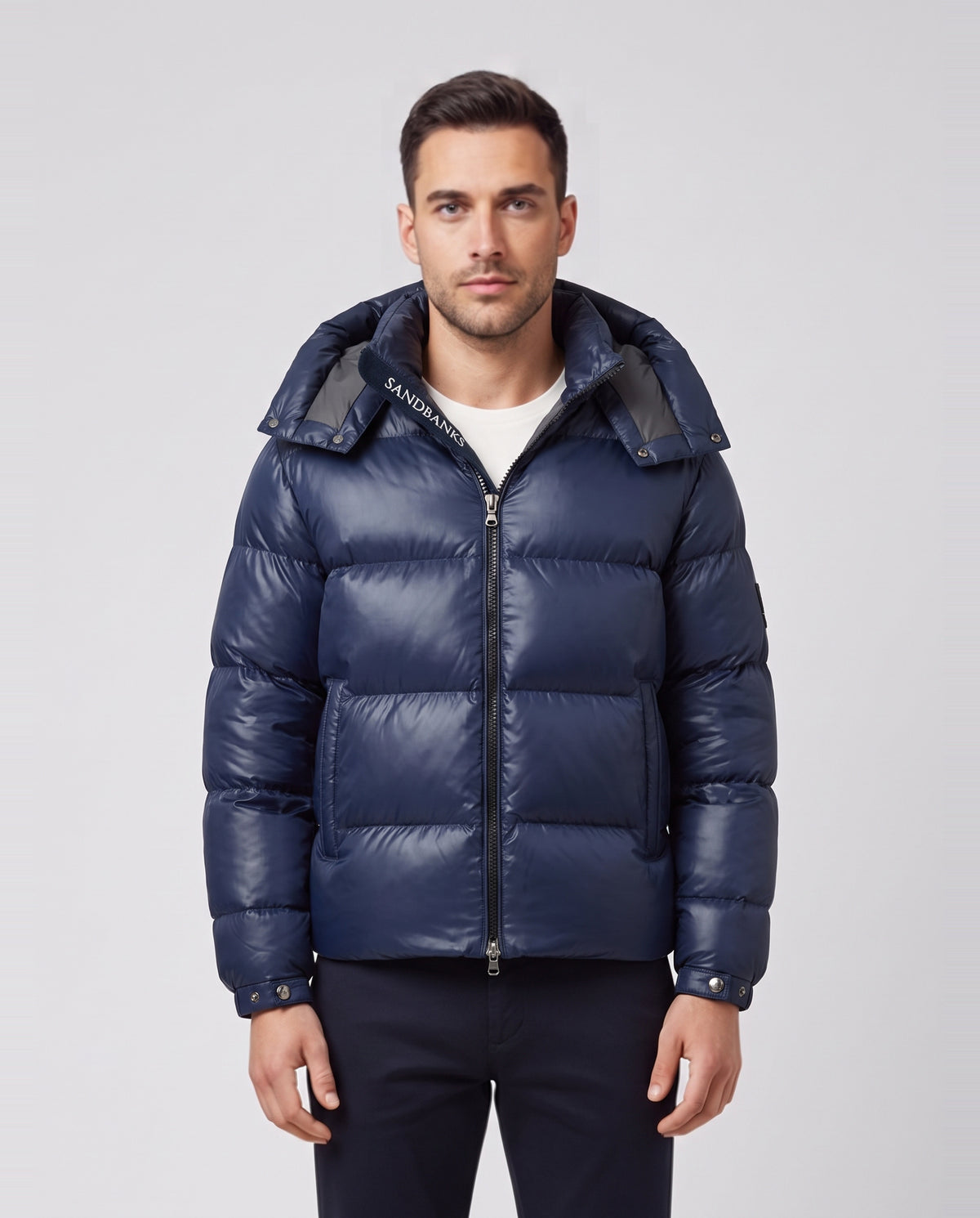 Men's Sandbanks Horizon Puffer in Navy — on model