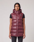 Women's Sandbanks Shell Bay Hooded Long Gilet in Port — on model