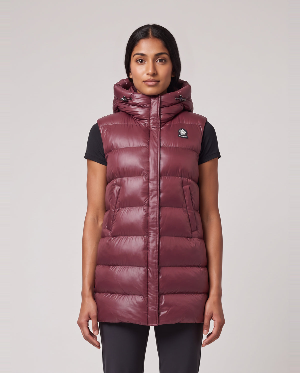 Women's Sandbanks Shell Bay Hooded Long Gilet in Port — on model