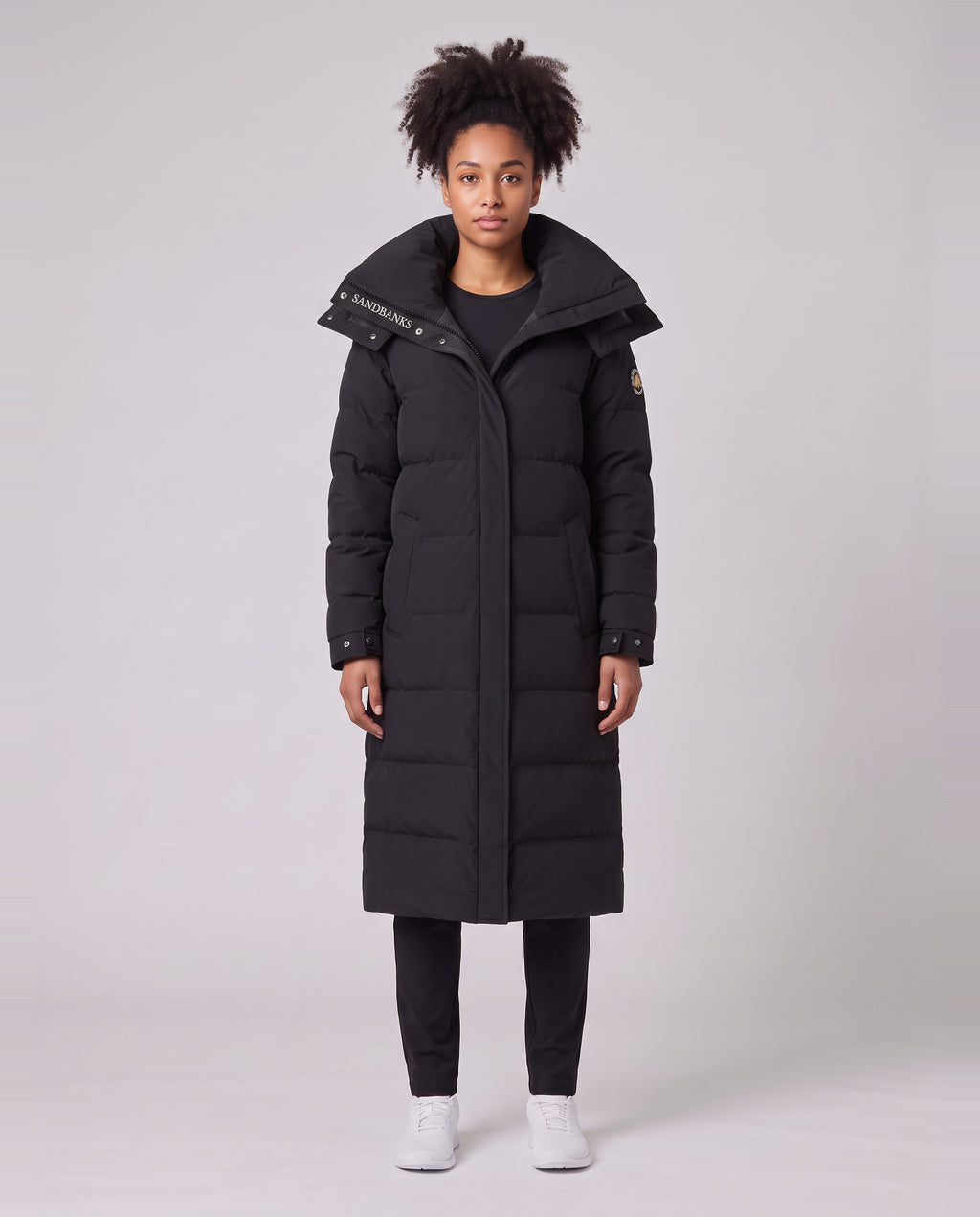 Women's Sandbanks Haven Black Long Puffer Jacket — on model