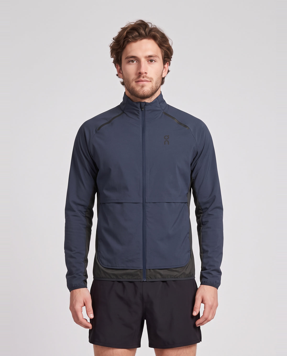 Men's On Running Weather Jacket Insulated in Navy I Eclipse — on model