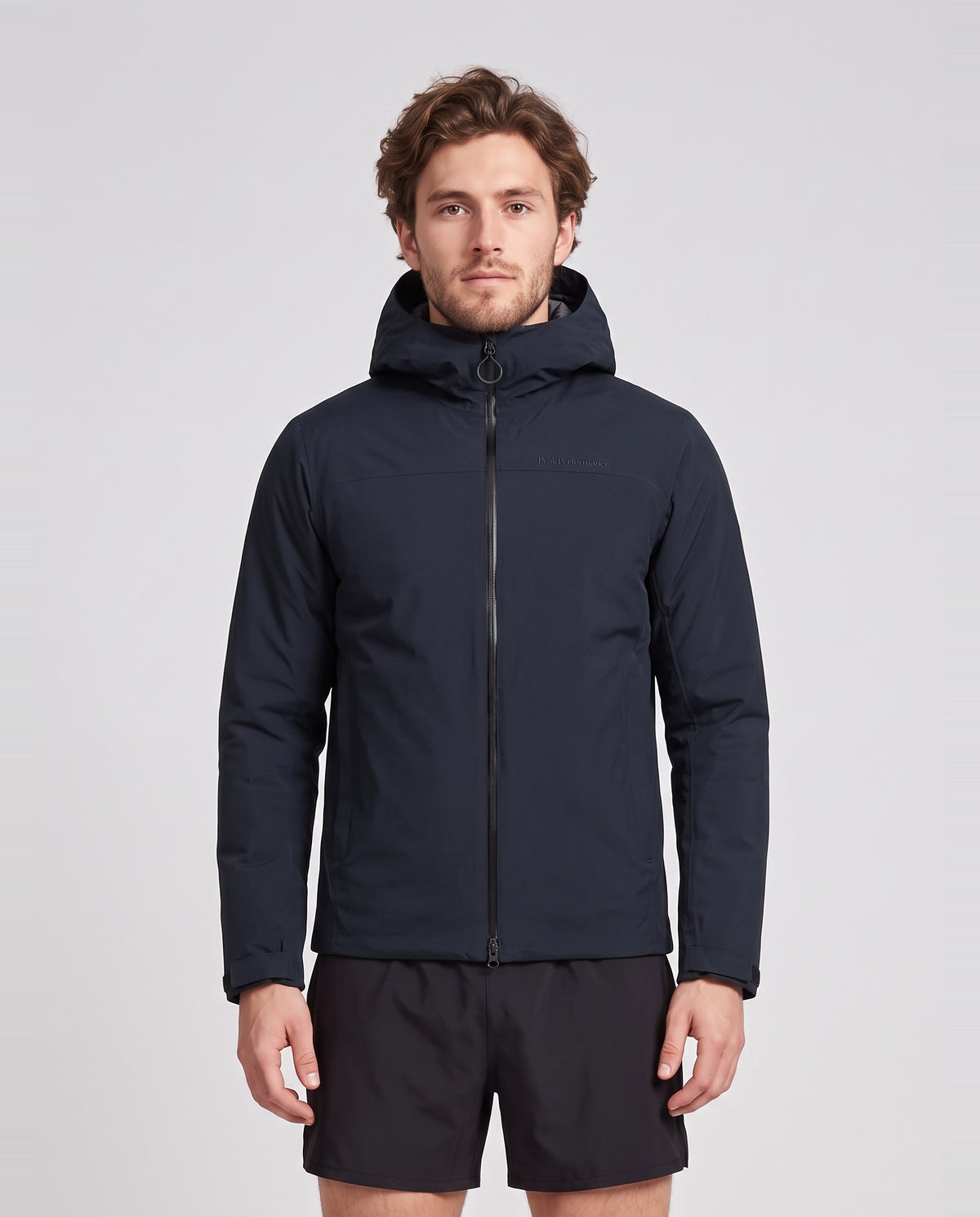 Men's Peak Performance Treeline Insulated Jacket in Black — on model