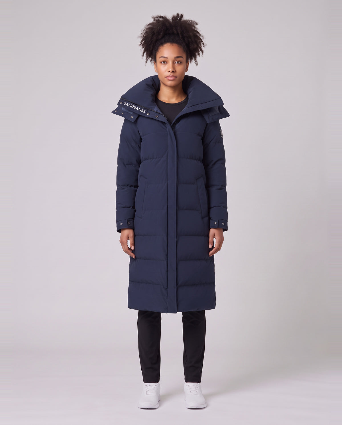 Women's Sandbanks Haven Navy Long Puffer Jacket — on model