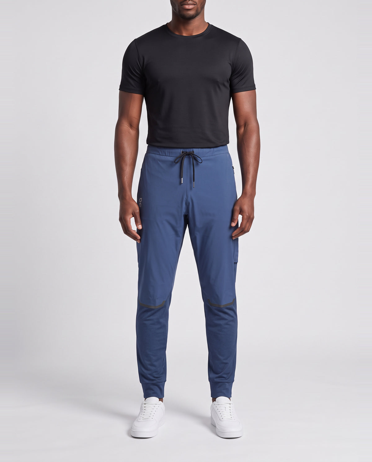 Men's On Running Navy Denim Weather Pants — on model