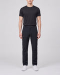 Men's Peak Performance Scale Softshell Pants in Black — on model