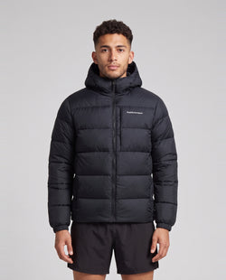 Men's Peak Performance Frost Down Puffer Jacket in Black — on model