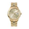 Gold wristwatch with gold-colored band and face.