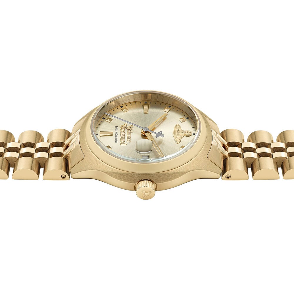 Close-up of a gold watch with a link band.