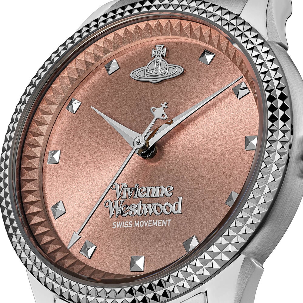 Close-up of a Vivienne Westwood watch with a rose gold dial and silver-tone accents.