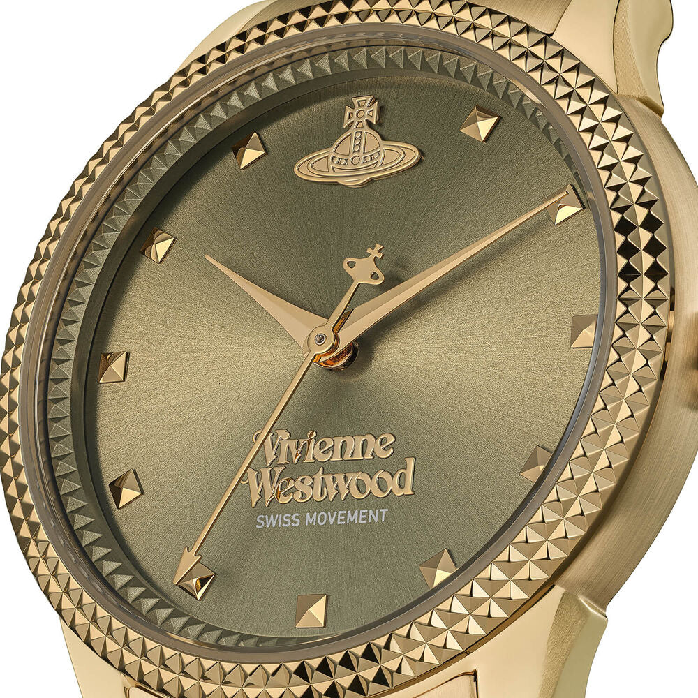 Close-up of a gold Vivienne Westwood wristwatch with a textured gold face.