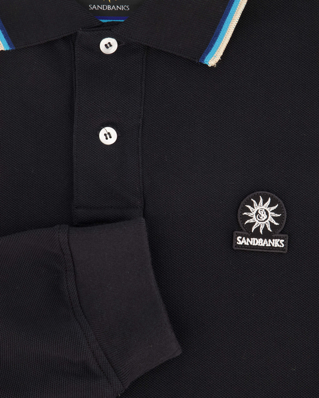 close up of sandbanks polo shirt